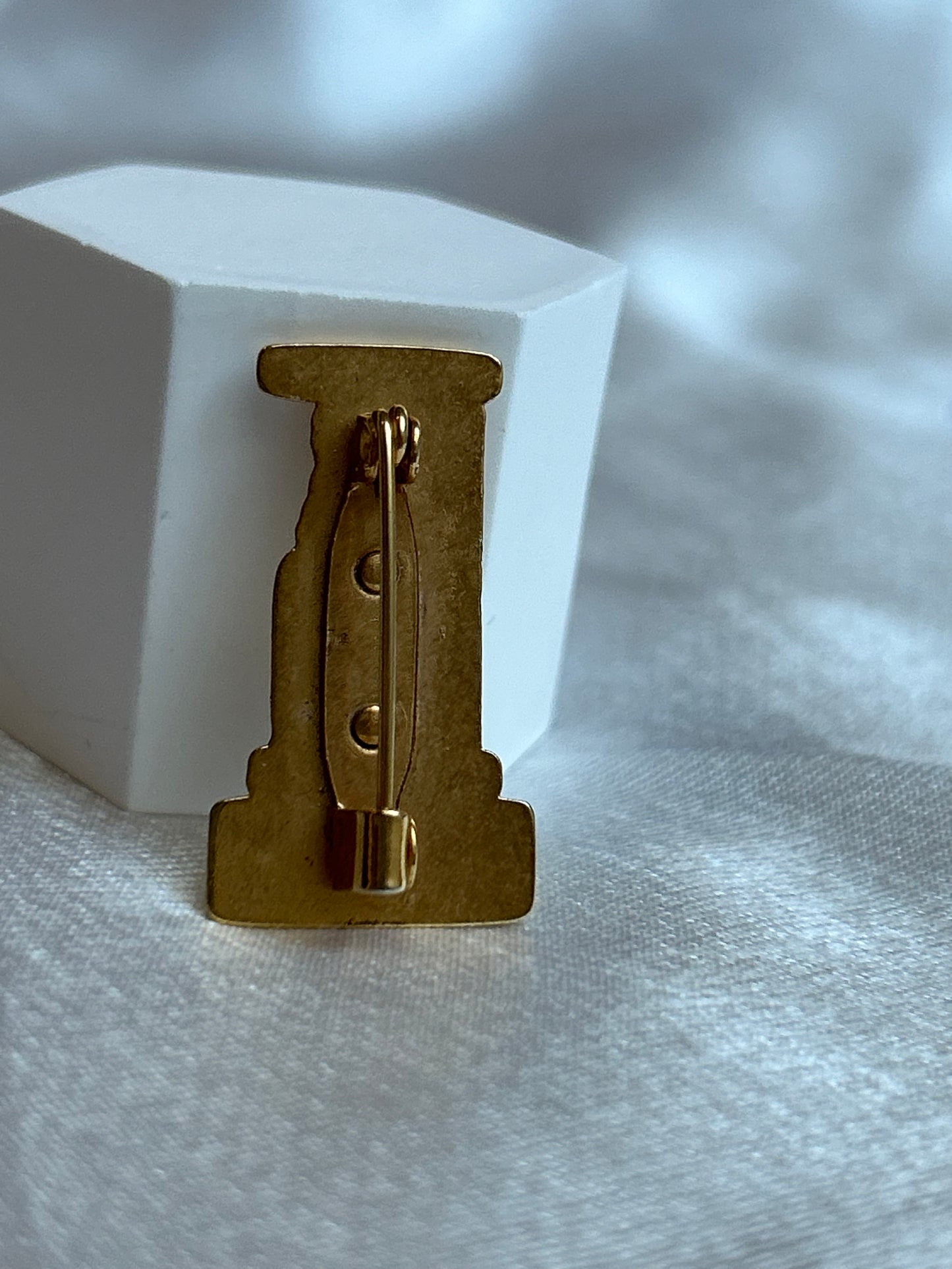 Broche vintage « un jours ailleurs » doré femme